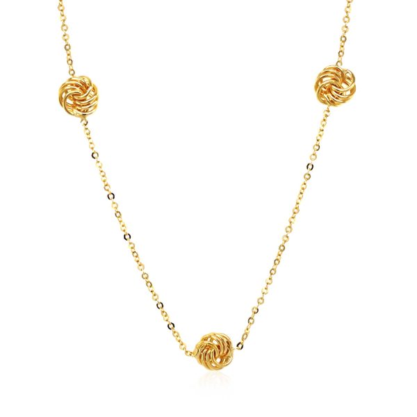 Station Necklace with Polished Love Knots in 14k Yellow Gold