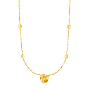 Station Necklace with Love Knot and Round Beads in 14k Yellow Gold