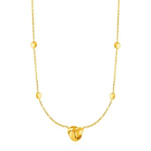 Station Necklace with Love Knot and Round Beads in 14k Yellow Gold